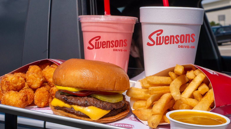 A burger, tots, fries, and drinks from Swensons.