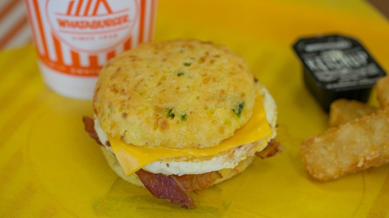A breakfast sandwich made with Whataburger's Jalapeño Cheddar Biscuits