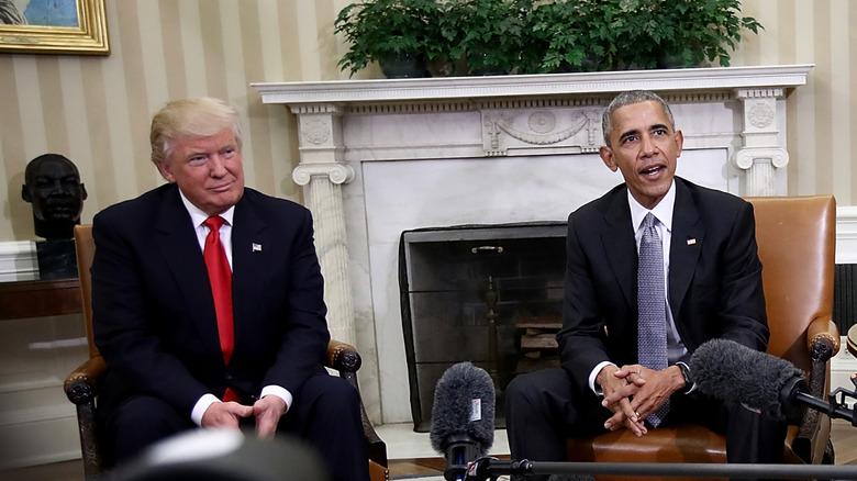 Presidents Barack Obama and Donald Trump seated together in the Oval Office