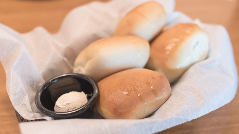 Texas Roadhouse rolls with cinnamon honey butter.