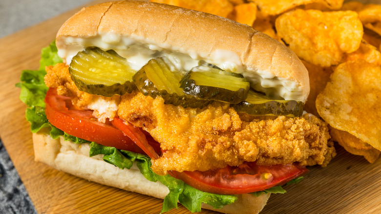 Fried catfish po'boy with potato chips.