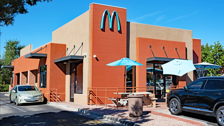 An exterior photo of the McDonald's in Sedona, Arizona, which has turquoise signage instead of golden arches