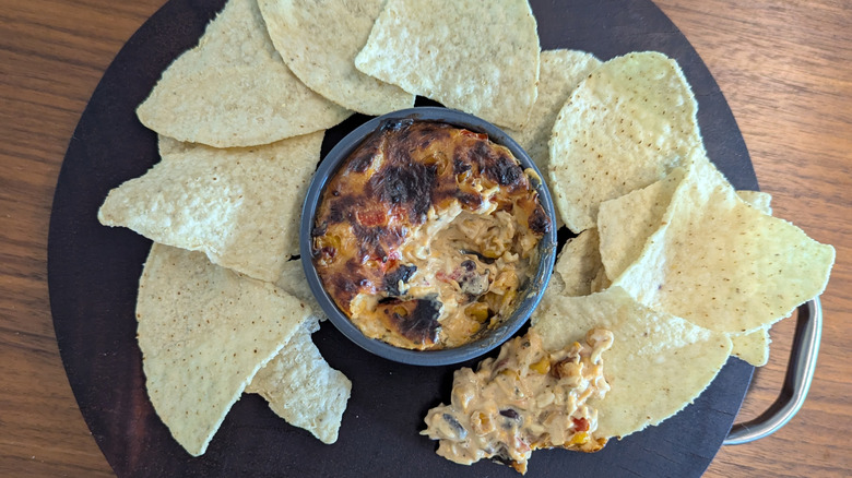 A simple dip made from Trader Joe's Cowboy Caviar, cream cheese, and shredded cheese