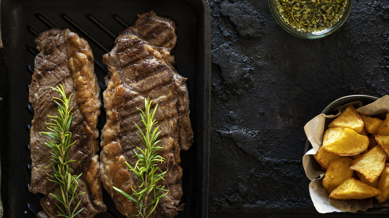 grilled strip steaks with sauce