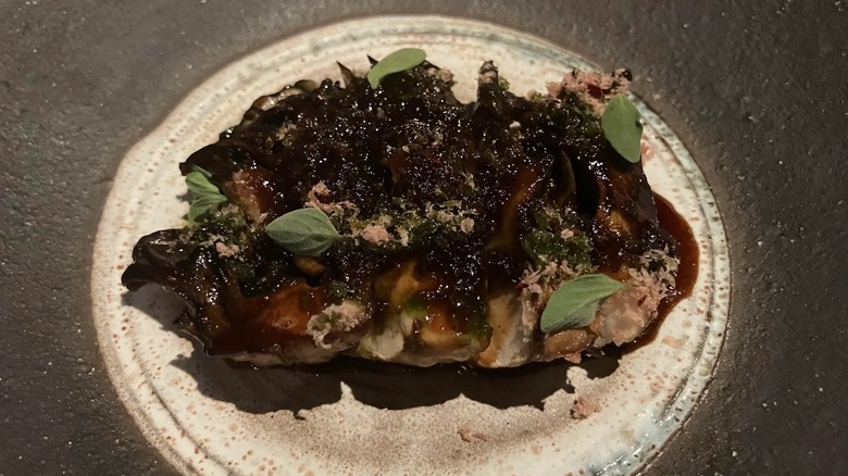 An example of fine dining sits on a white plate