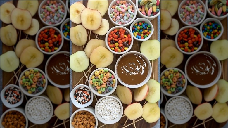 caramel apple board with candy toppings