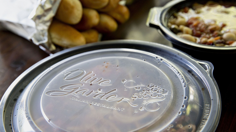 Olive Garden restaurant take out containers and breadsticks