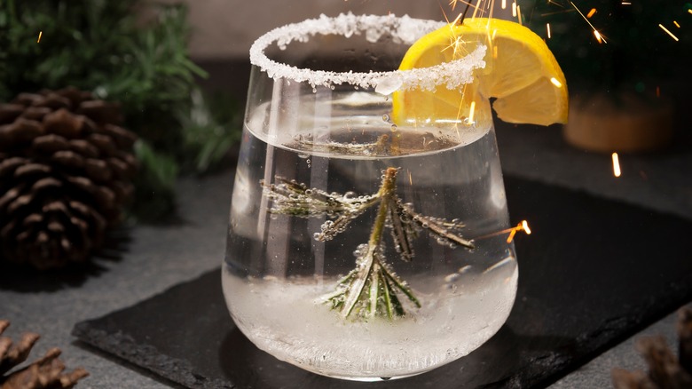 cocktail with rosemary tree in glass