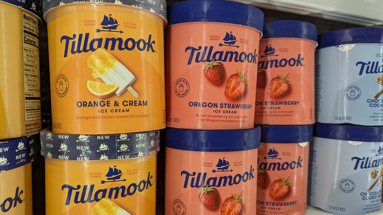 Containers of Tillamook ice cream sit on a store shelf