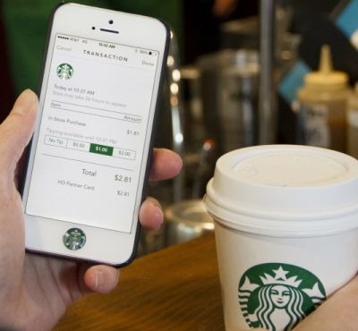 The new Starbucks mobile app lets customers tip easily. But, will they?