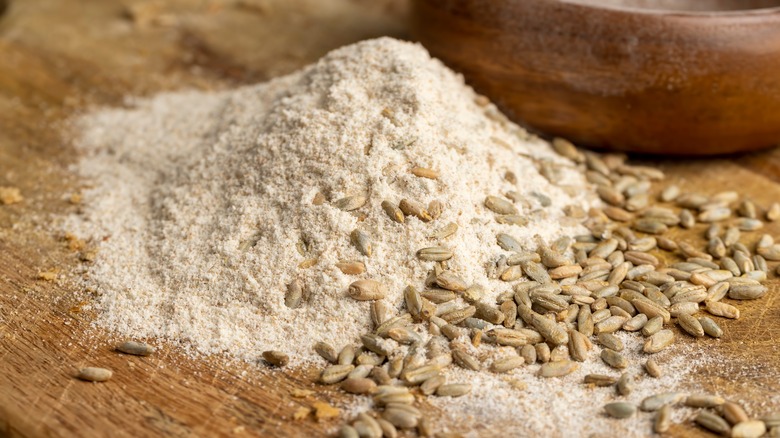 wheat flour on wooden counter