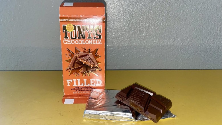 Unwrapped Tony Chocolonely Gooey Caramel Sea Salt Crunch Filled Chocolate Bar