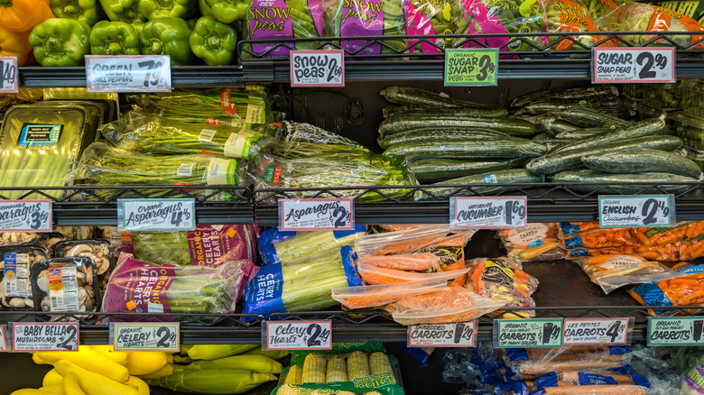 Produce aisle at Trader Joe's filled with plastic-wrapped produce