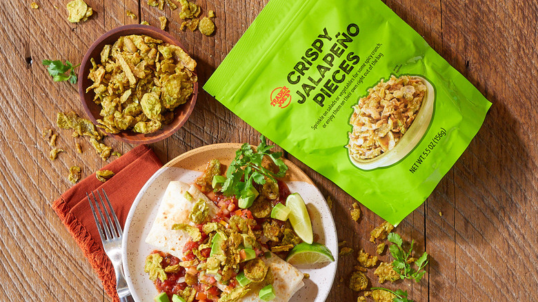 Garnished meal next to a bowl of Trader Joe's Crispy Jalapeño Pieces