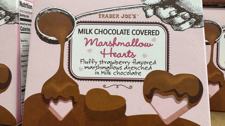 A box of Trader Joe's chocolate-covered marshmallow hearts sits on a display