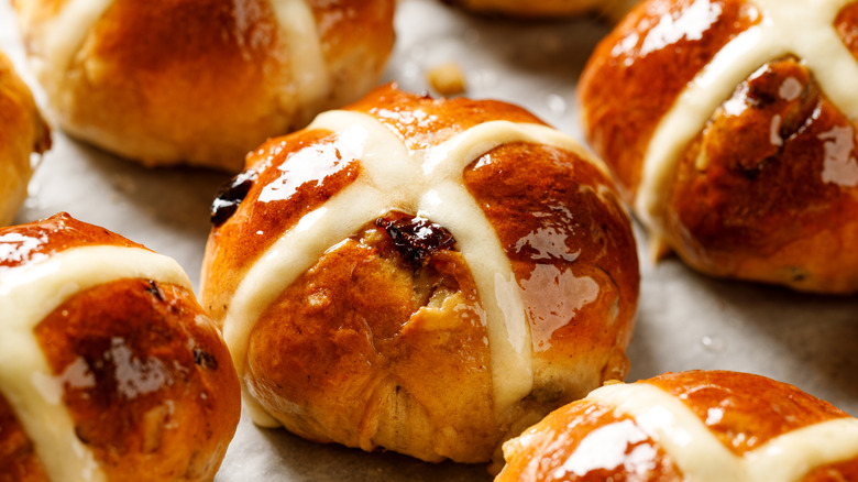 a tray of fresh hot cross buns