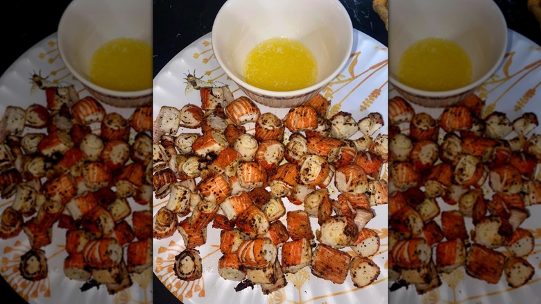 Platter of air fried imitation crab served with melted butter.