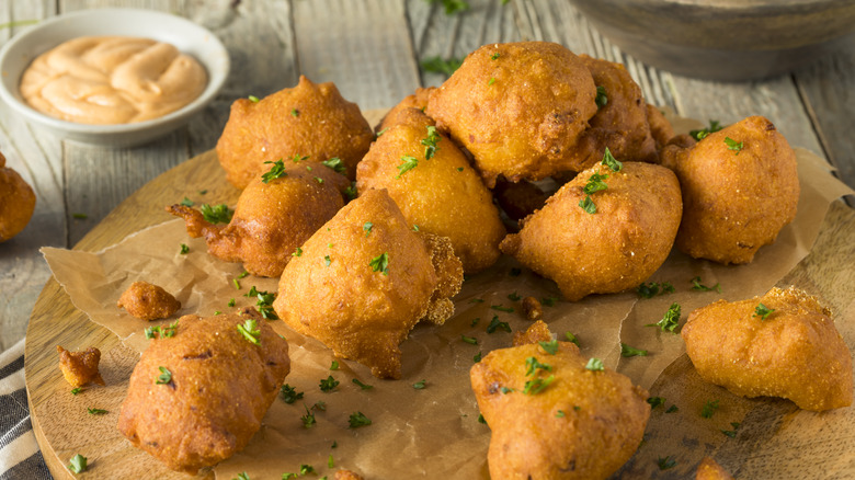 hushpuppies on wooden plate