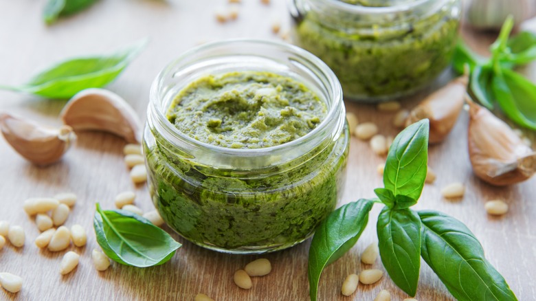 green pesto in glass bowl