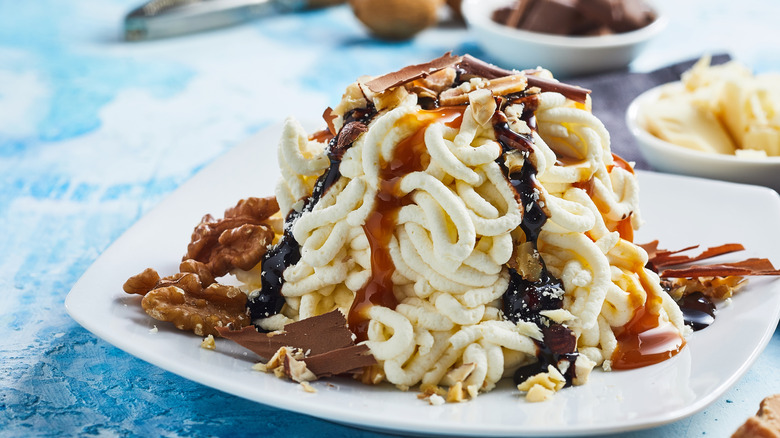 vanilla  spaghetti ice cream with caramel and fudge drizzle