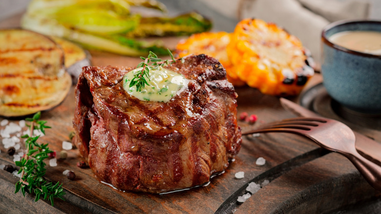 melting butter on steak