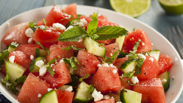 Closeup bowl of chopped watermelon and cucumber salad