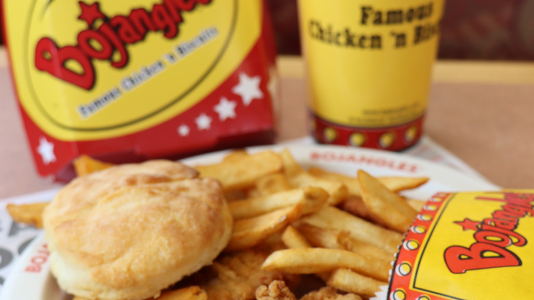Plate of Bojangles food with french fries and a biscuit
