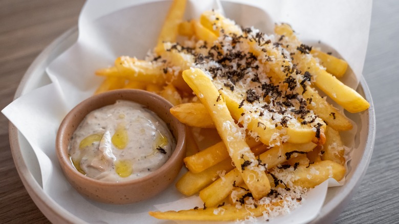 Bowl of fries with Parmesan and truffle seasoning