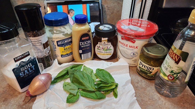 The ingredients to make a homemade batch of green goddess dressing