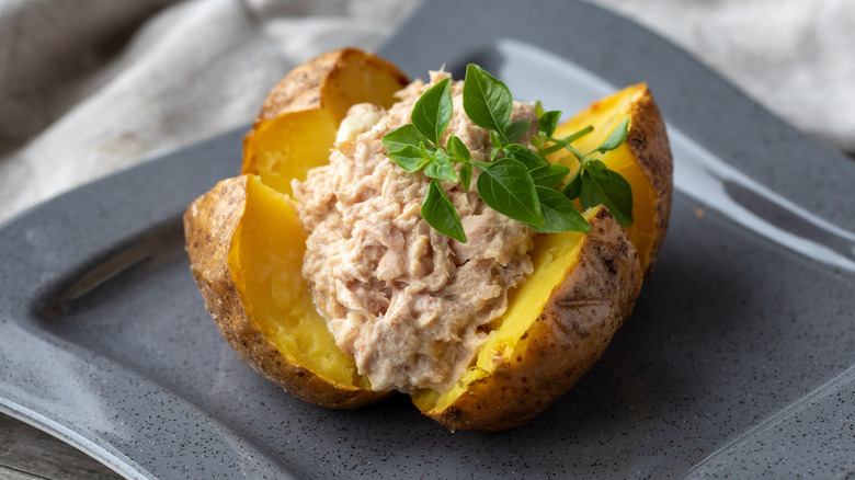 Baked potato with tuna salad filling