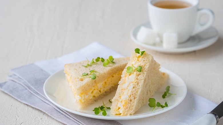 Tea sandwiches in triangles with egg salad