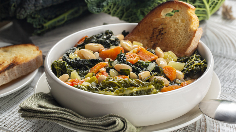 Bowl of ribollita with toasted bread inside