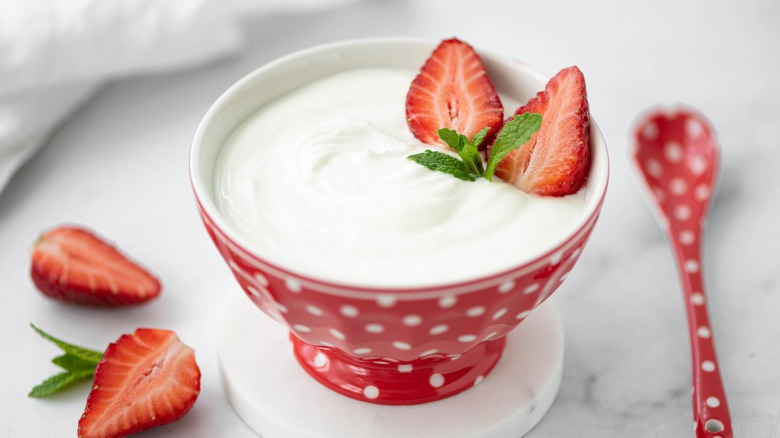 Plain greek yogurt with strawberries