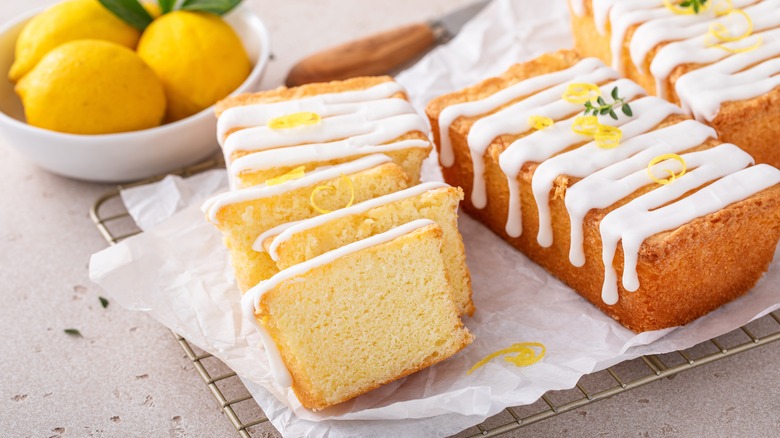 Lemon loaf cakes sliced on rack