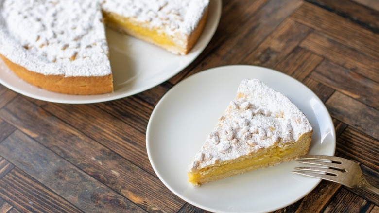 torte with powdered sugar topping