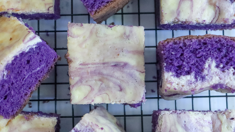 ube cheesecake brownies on rack