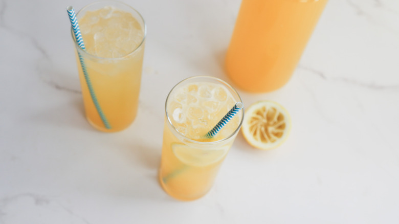 glasses of lemonade with straws