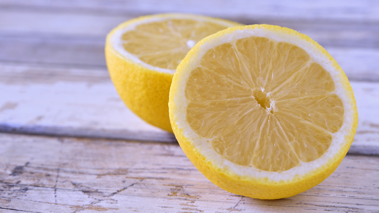 Sliced lemon on a wood surface