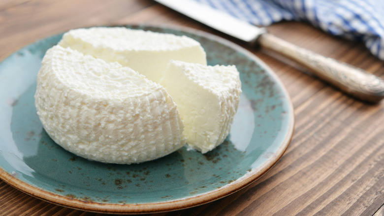 Fresh ricotta on a blue plate
