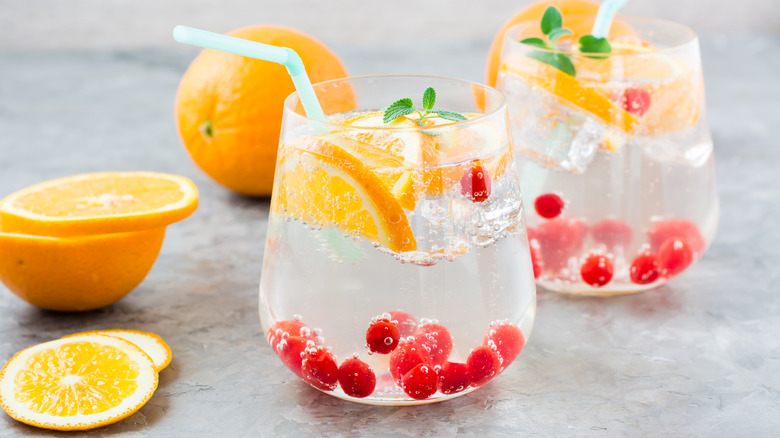 Seltzer with fruit and straw