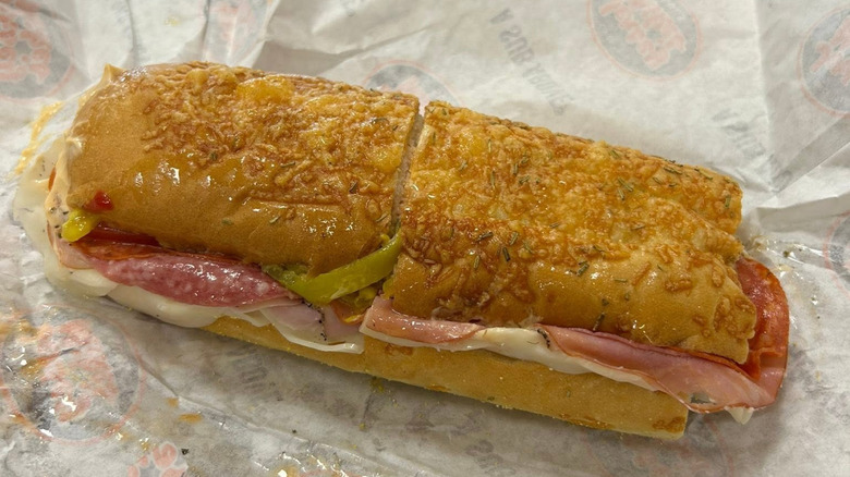 A Jersey Mike's sub is on a rosemary parmesan roll.