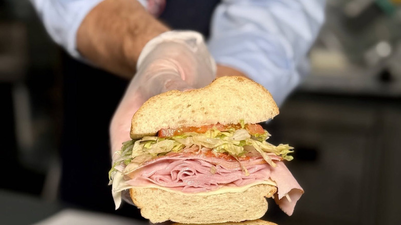 A Jersey Mike's sub is cut open to reveal what's inside.