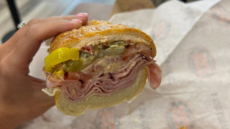 A Jersey Mike's sub is drenched with chipotle mayo.