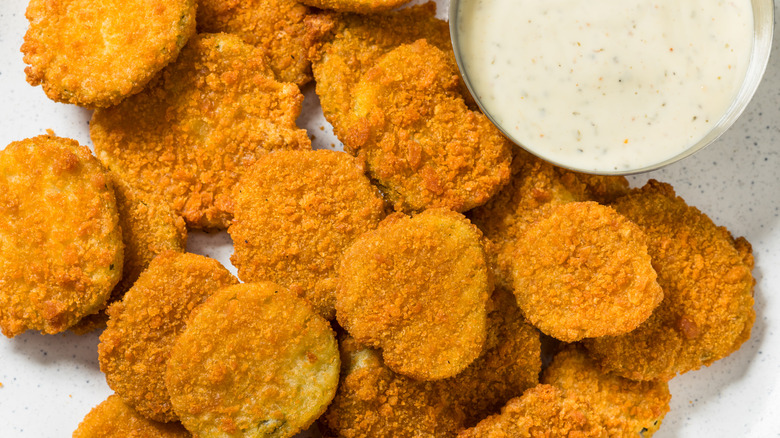 Fried pickles with ranch dressing.