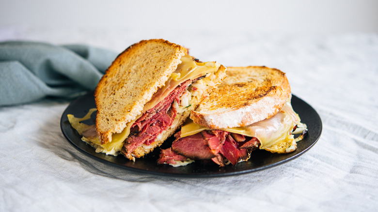 A sliced Reuben sandwich.