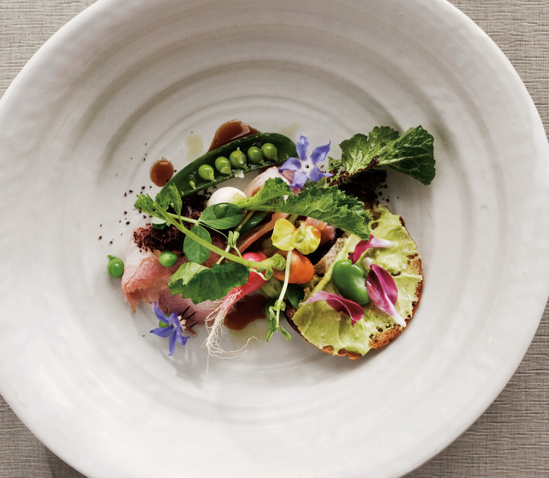 Brighten up your veal dish with flowers and fava beans.
