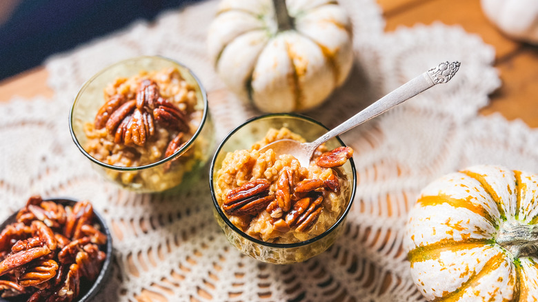 Pumpkin pecan rice pudding in dishes