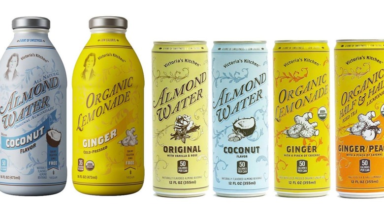 Bottles and cans of Victoria's Kitchen Almond Water