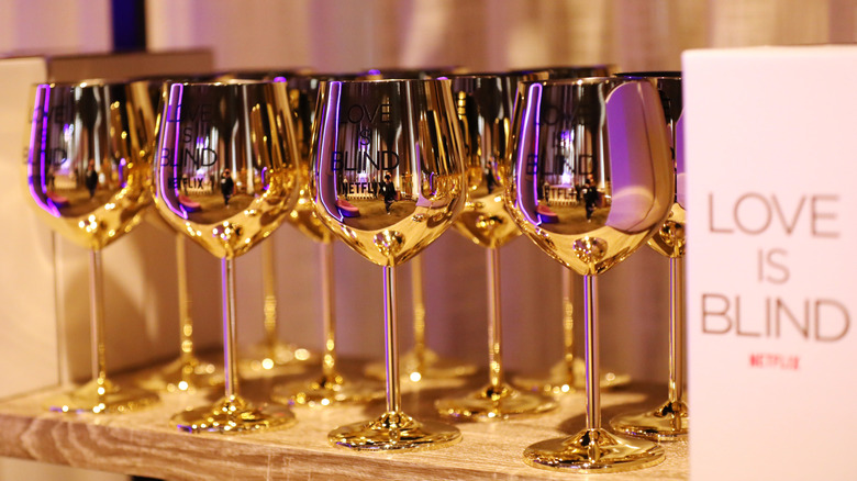 Love Is Blind gold cups