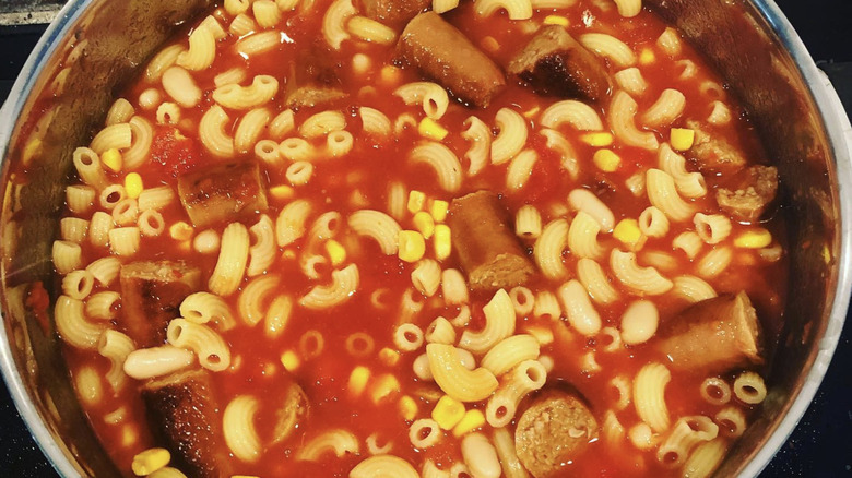 Hoover stew being cooked in a large metal pot